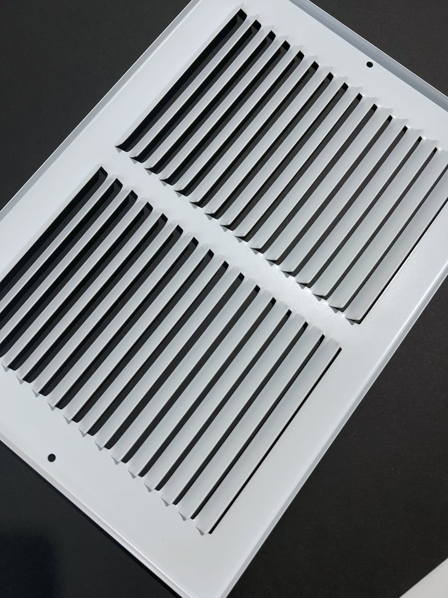 Fits 12x12 Duct Opening Stamped Steel Return Air Grille Vent Cover Grille for Sidewall and Ceiling in White Surface Dimensions: 13.75"W X 13.75"H (12" W x 12" H Duct Opening)