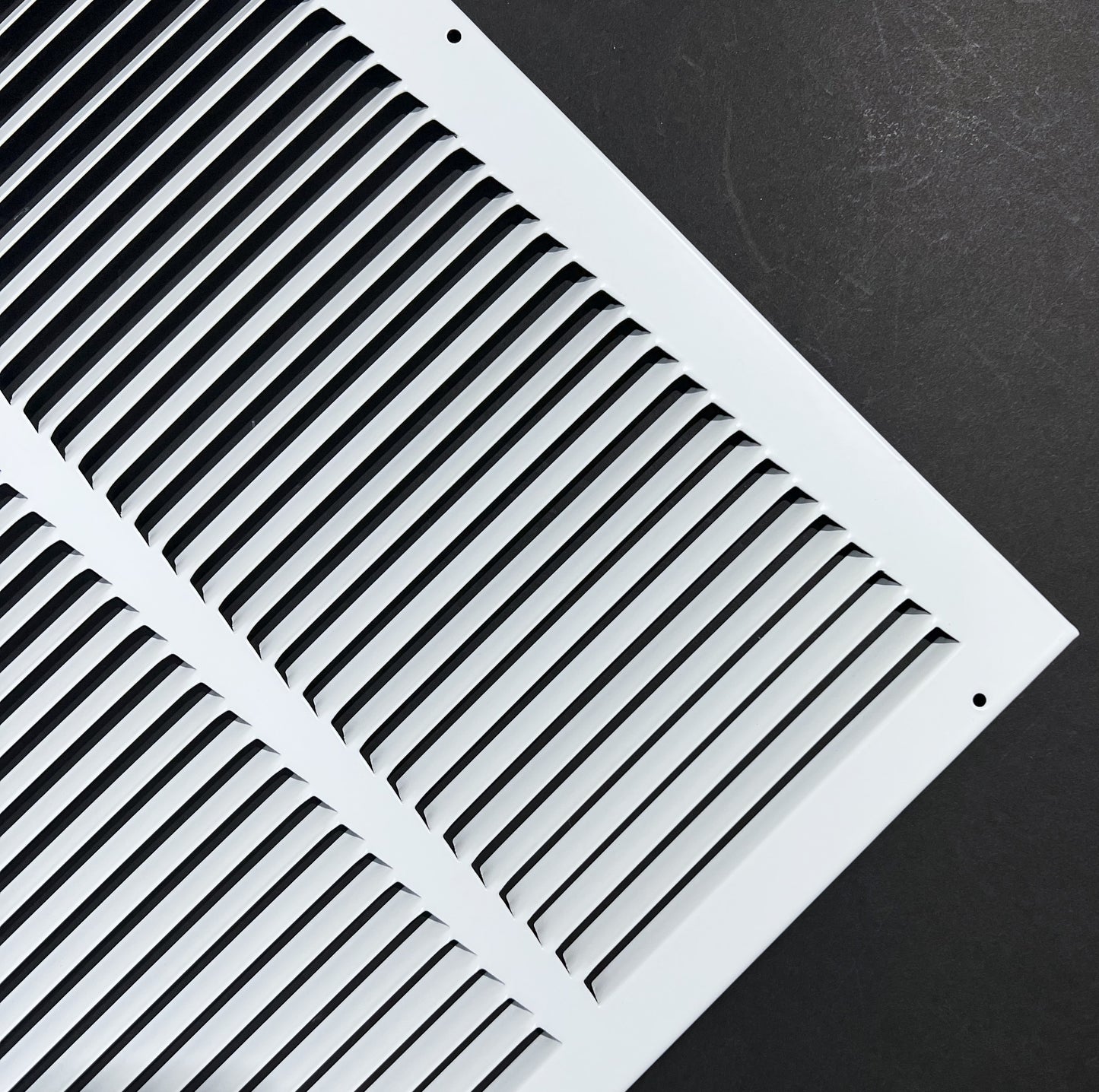 Fits 20x20 Duct Opening Stamped Steel Return Air Grille Vent Cover Grille for Sidewall and Ceiling in White Surface Dimensions: 21.75"W X 21.75"H (20" W x 20" H Duct Opening)