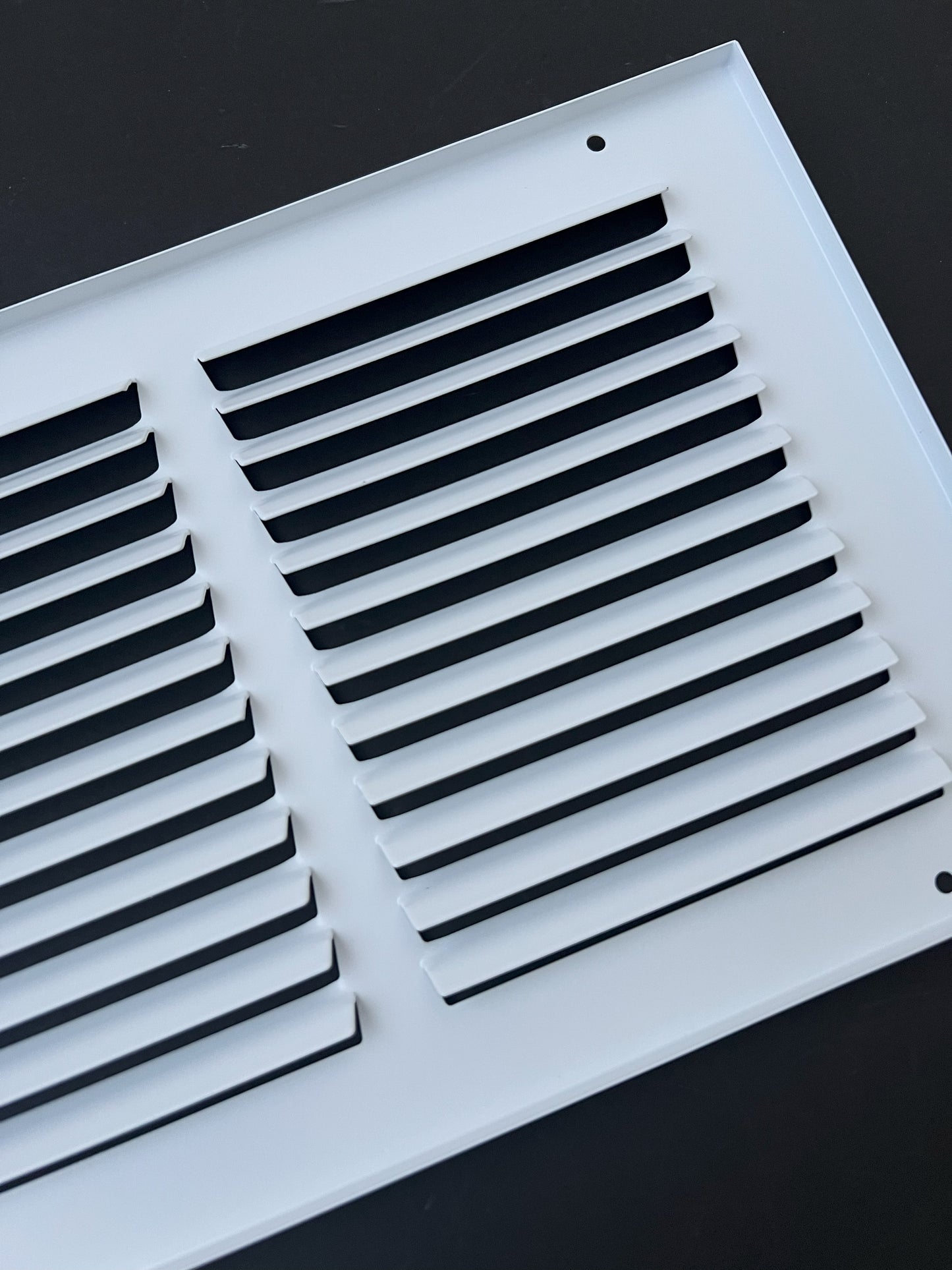 Fits 8x8 Duct Opening Stamped Steel Return Air Grille Vent Cover Grille for Sidewall and Ceiling in White Surface Dimensions: 9.75"W X 9.75"H (8" W x 8" H Duct Opening)